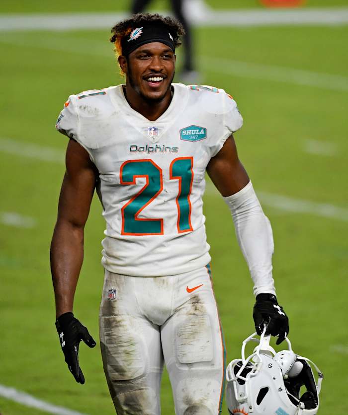 Oct 18, 2020; Miami Gardens, Florida, USA; Miami Dolphins free safety Eric Rowe (21) celebrates after defeating the New York Jets at Hard Rock Stadium.